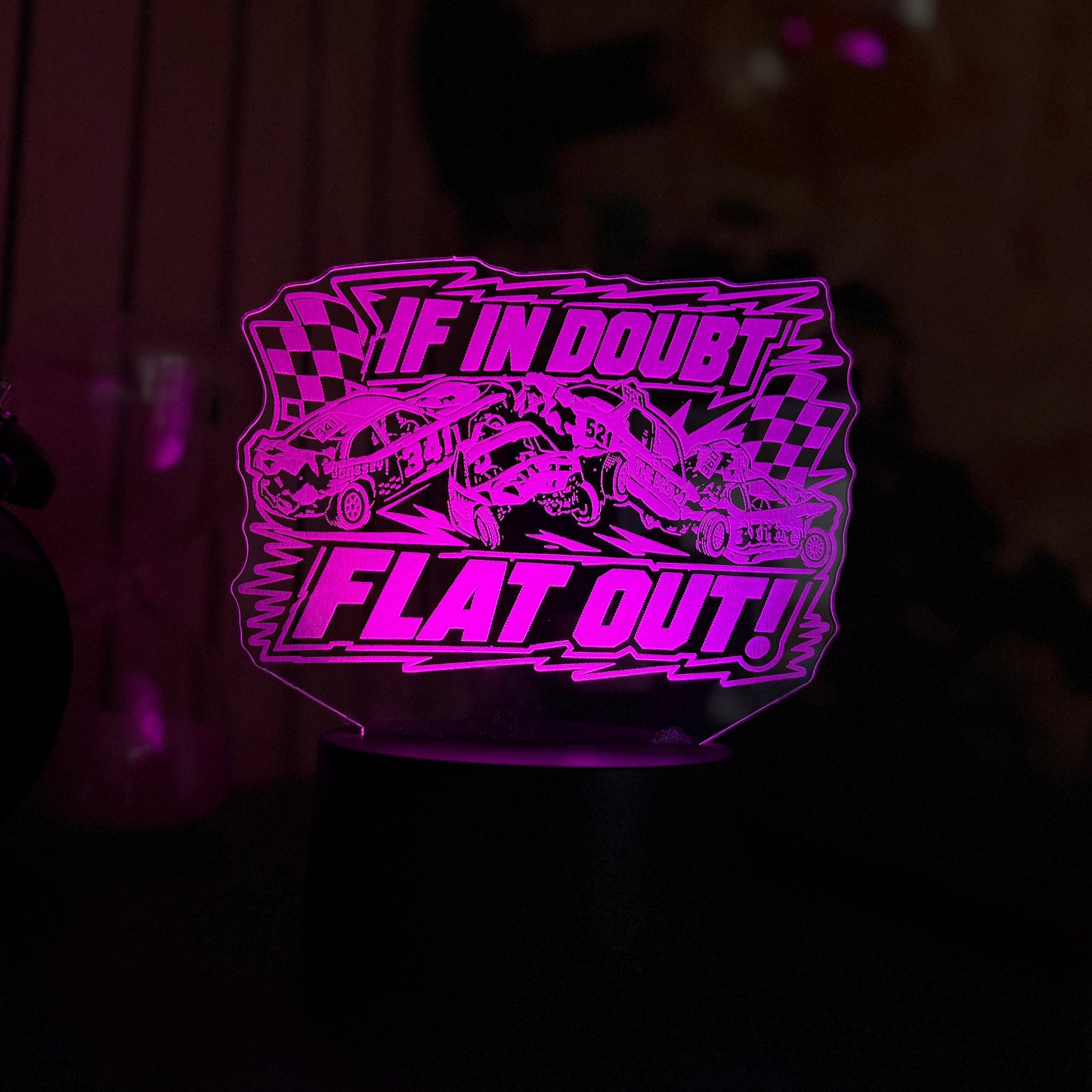 If In Doubt Flat Out banger racing night light cyan LED on bedside table next to alarm clock