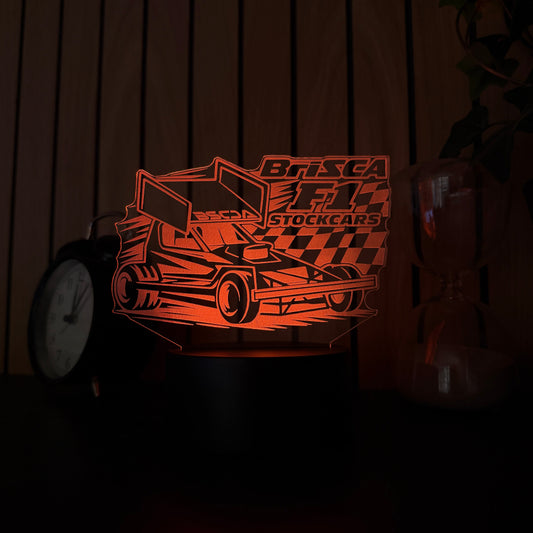 Brisca F1 stock car acrylic night light orange  LED on bedside table next to alarm clock