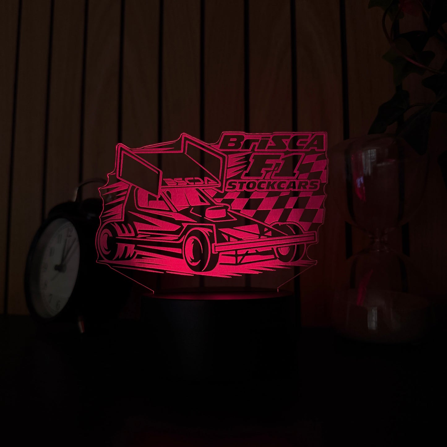 Brisca F1 shale wing stock car LED night light illuminated in pink showing laser engraved acrylic detail
