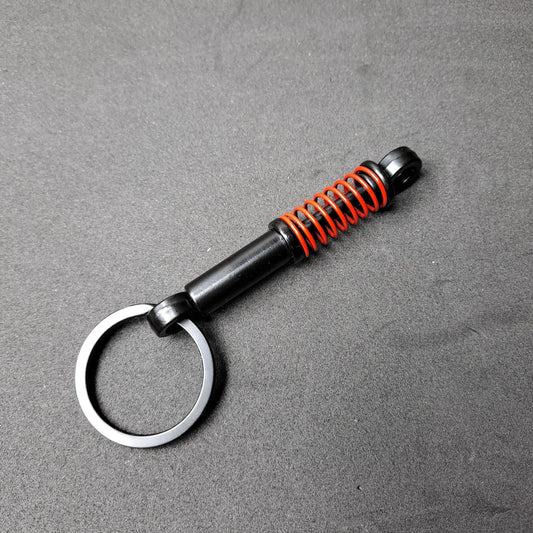 Spring Suspension Shock Absorber Keyring  Key Ring Stock Car & Banger Toy Tracks